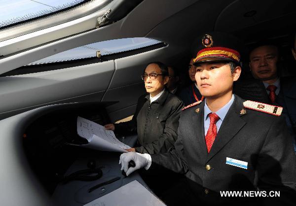 The driver operates the train CRH380A of China Railway High-Speed (CRH), which runs between the north China's Zaozhuang city and Bengbu in the south, a segment of the Beijing-Shanghai high-speed rail line, Dec. 3, 2010. 