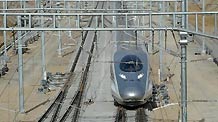 The train CRH380A of China Railway High-Speed (CRH) enters Bengbu south railway station, a stop in Anhui Province on the Beijing-Shanghai high-speed rail line, Dec. 3, 2010.