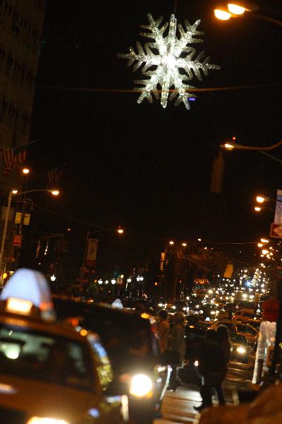 A Christmas star blings on the Fifth Avenue in New York Dec. 4, 2010. 