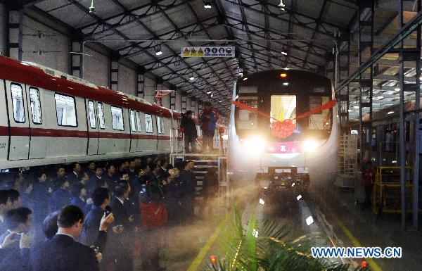 Photo taken on Dec. 6, 2010 shows the first train Changchun Railway Vehicles Company manufactured for MTR Corporation's West Island Line (WIL) project in Changchun, northeast China's Jilin Province.
