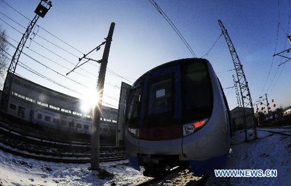 Photo taken on Dec. 6, 2010 shows the first train Changchun Railway Vehicles Company manufactured for MTR Corporation's West Island Line (WIL) project in Changchun, northeast China's Jilin Province. 