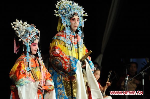 Fans of the Peking Opera perform in Beijing, capital of China, Dec. 11, 2010. Fans gathered together during a celebration in Beijing Saturday as Peking Opera was recognized as an intangible cultural heritage in November by the United Nations Educational, Scientific, and Cultural Organization (UNESCO). (Xinhua/Zhang Xu) (zhs) 