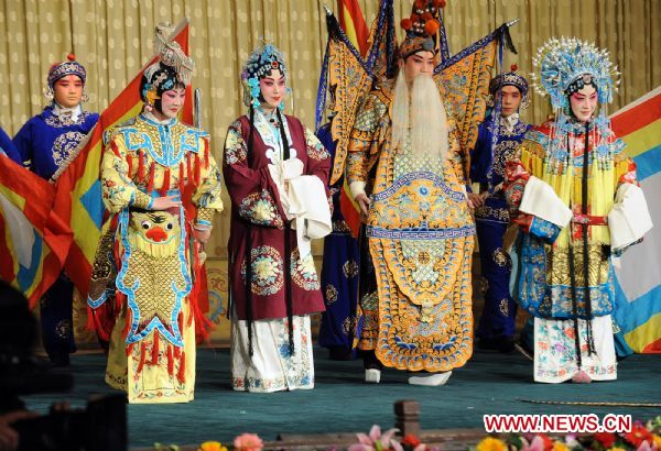 Award-winning fans of the Peking Opera perform in Beijing, capital of China, Dec. 11, 2010. Fans gathered together during a celebration in Beijing Saturday as Peking Opera was recognized as an intangible cultural heritage in November by the United Nations Educational, Scientific, and Cultural Organization (UNESCO). (Xinhua/Zhang Xu) (zhs) 