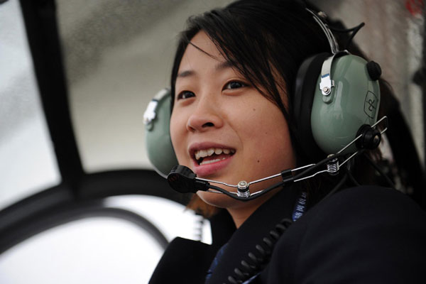 Su Shan, who is among the country&apos;s first three women helicopter pilots, prepares to fly a Schwarzer 300CBI chopper on Sunday in Hefei, capital of east China&apos;s Anhui Province, Dec 13, 2010. 