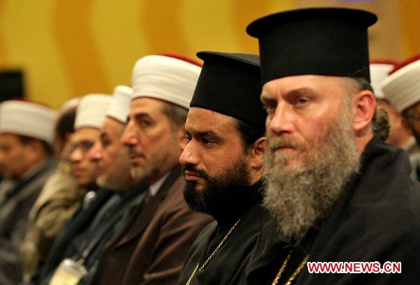 Muslims, Christians and Jewish clergymen attend the First International Islamic-Christian Conference in the West Bank city of Bethlehem, Dec. 14, 2010. 