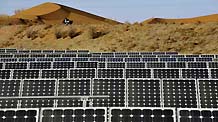 A photovoltaic (PV) power system is assembled at the edge of Tengger Desert in Zhongwei City, northwest China's Ningxia Hui Autonomous Region, Dec 14, 2010.