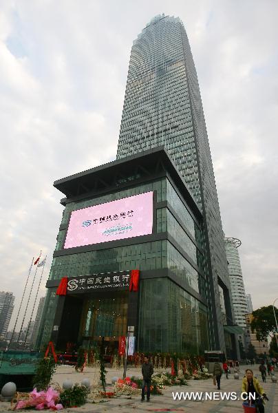 Photo taken on Dec. 18, 2010 shows a 68-storey building of China Minsheng Bank in Wuhan, capital of central China&apos;s Hubei Province.