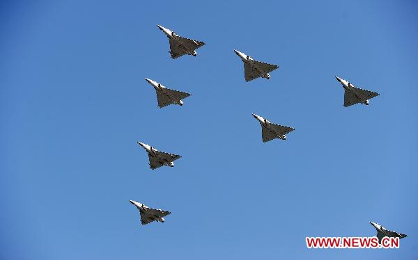 Qatar air force take part in a military parade during Qatar&apos;s National Day in Doha, Qatar, on Dec. 18, 2010.