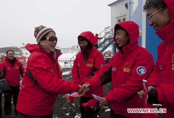 Chinese State Councilor Liu Yandong(1st L front) inspects China's Changcheng (Great Wall) Station, located south of King George Island, Antarctica, Dec. 25, 2010.