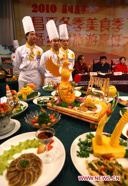 Contestants display their dishes during a cooking competition in Changping District in Beijing, capital of China, Dec. 26, 2010. 