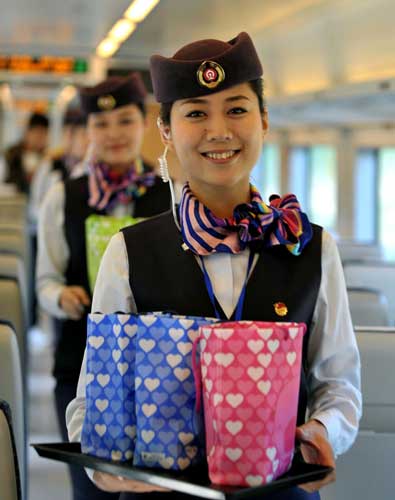 Crew members on the train prepare gifts for the passengers, Dec 26, 2010. 