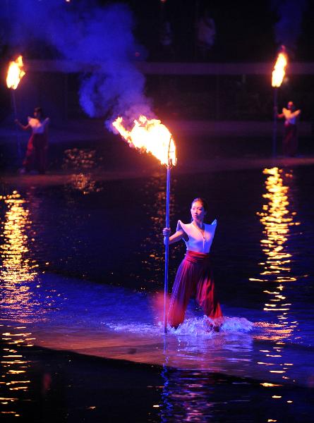 Actors perform during the dress rehearsal of a New Year celebration evening of Taipei Flora Expo in Taipei, southeast China's Taiwan, Dec. 28, 2010. 