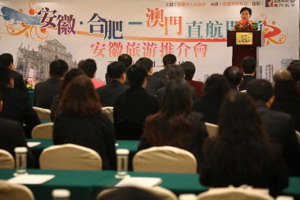 Delegates attend a tourism promotion campaign in Macao, south China, Dec. 28, 2010.