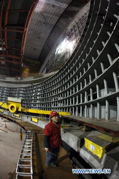 A worker works at the Three Gorges' underground power station in Yichang, central China's Hubei Province, Jan. 2, 2011.