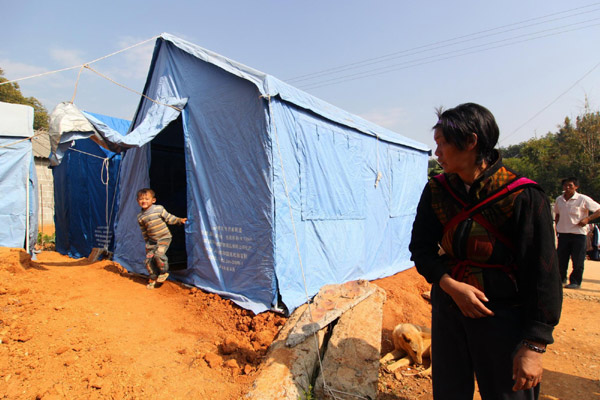 Temporary tents are set up in Yingjiang County, Yunnan Province on Jan 3, 2011.