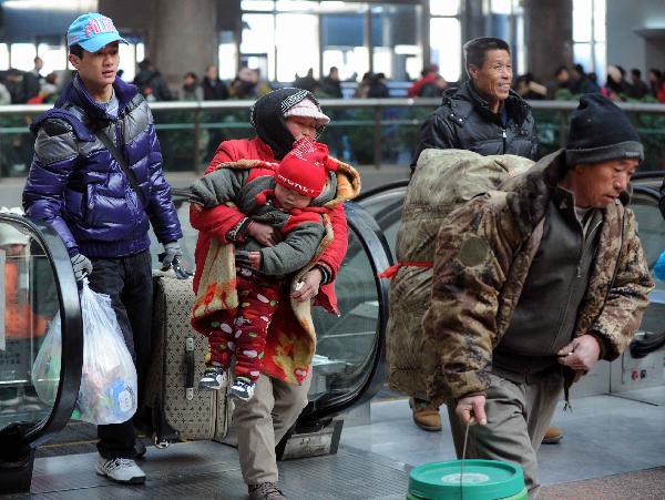 Passengers are seen at Beijing West Railway Station in Beijing, capital of China, Jan. 9, 2011. 