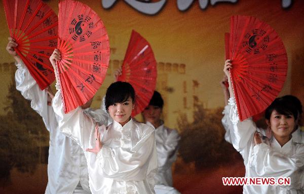 Chinese actresses perform during a performance in Bishkek, Kyrgyzstan, Jan. 10, 2011. 