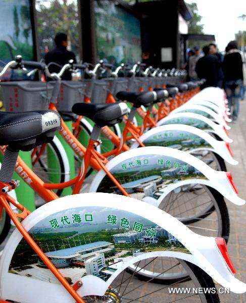Public bicycles are seen at a rent point in Haikou, capital of south China's Hainan Province, Jan. 11, 2011. 