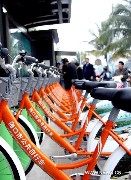 Public bicycles are seen at a rent point in Haikou, capital of south China's Hainan Province, Jan. 11, 2011.