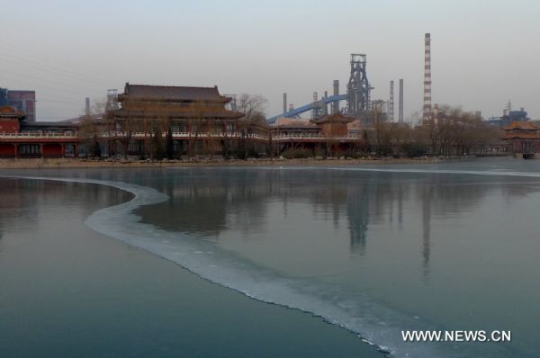 A lake in Shougang factory freezes for the first time because of production stop in Beijing, capital of China, Jan. 13, 2011. 