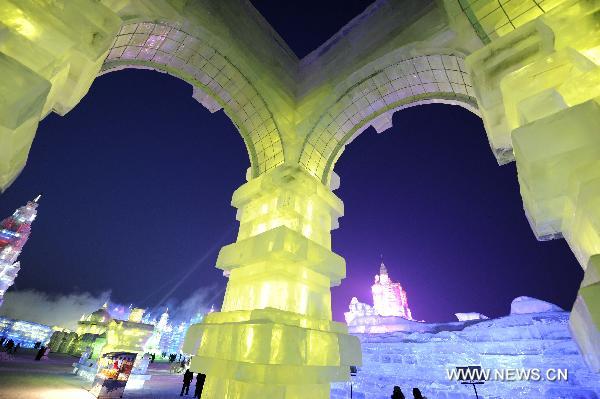 Tourists visit the Ice and Snow World in Harbin, capital of northeast China's Heilongjiang Province, Jan. 15, 2011. 