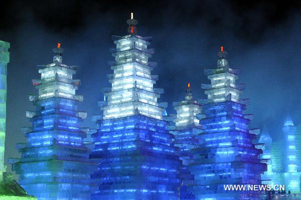 Photo taken on Jan. 15, 2011 shows the lit ice pagodas at the Ice and Snow World in Harbin, capital of northeast China's Heilongjiang Province.