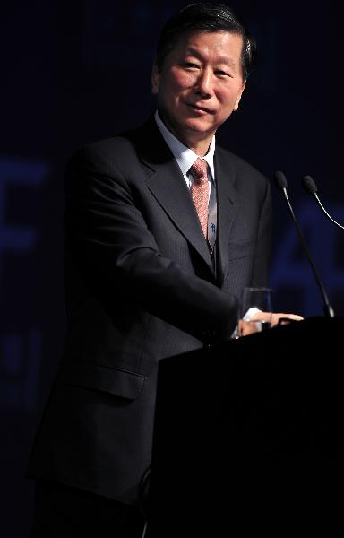 Shang Fulin, chairman of China's Securities Regulatory Commission, delivers a speech at the opening ceremony of the Asian Financial Forum (AFF) 2011 in Hong Kong, south China, Jan. 17, 2011.