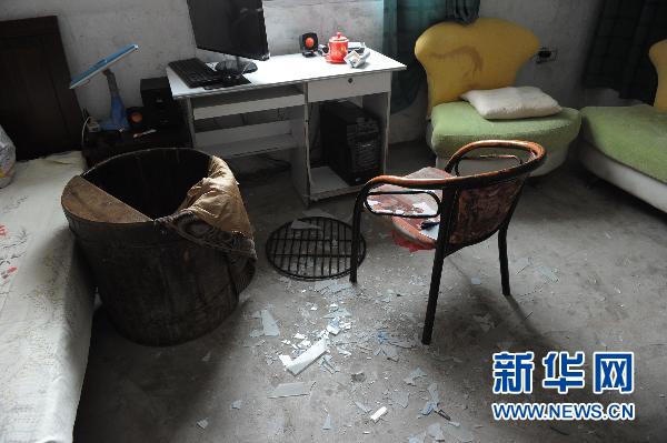 Shattered glass in Yangqiao Town of Anqing City, Jan. 19 as an earthquake measuring 4.8 on the Richter scale hit Anqing City in east China&apos;s Anhui Province Wednesday. 