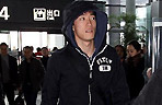 China's 110m hurdlist Liu Xiang walks in the airport as he leaves for Beijing for the Fourth Session of the 11th National Committee of the Chinese People's Political Consultative Conference (CPPCC) in Shanghai, east China, March 1, 2011.