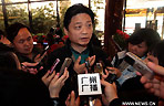Chinese talk show presenter and culture lion Cui Yongyuan (C), also a member of the Fourth Session of the 11th National Committee of the Chinese People's Political Consultative Conference (CPPCC), speaks to media in Beijing, capital of China, March 2, 2011.