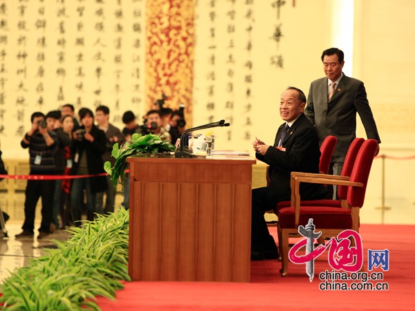 Li Zhaoxing, the spokesman of the fourth session of the 11th National People's Congress (NPC), provides information about the session and answers questions from the media.