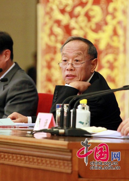 Li Zhaoxing, the spokesman of the fourth session of the 11th National People's Congress (NPC), provides information about the session and answers questions from the media. 