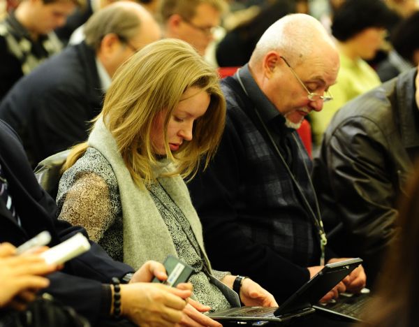 Journalists work during the news conference on the Fourth Session of the 11th National People's Congress (NPC) at the Great Hall of the People in Beijing, capital of China, March 4, 2011. 