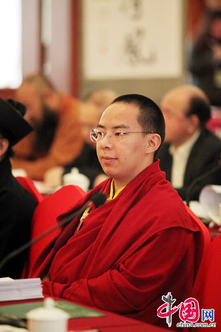 The 11th Panchen Lama, Bainqen Erdini Qoigyijabu, deliberates the government work report presented by Chinese Premier Wen Jiabao to the National People&apos;s Congress (NPC) with other political advisors at the annual session of the Chinese People&apos;s Political Consultative Conference (CPPCC).