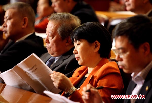 Members of the Fourth Session of the 11th National Committee of the Chinese People&apos;s Political Consultative Conference (CPPCC) attend the third plenary meeting of the Fourth Session of the 11th CPPCC National Committee at the Great Hall of the People in Beijing, capital of China, March 9, 2011.