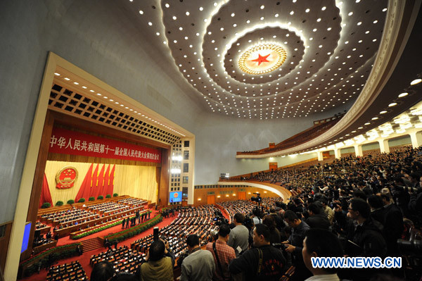 The Fourth Session of the 11th National People's Congress holds its closing meeting at the Great Hall of the People in Beijing, China, March 14, 2011.