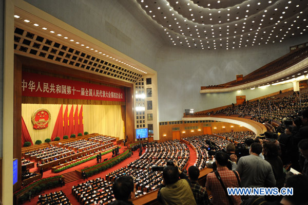 The Fourth Session of the 11th National People's Congress holds its closing meeting at the Great Hall of the People in Beijing, China, March 14, 2011. 