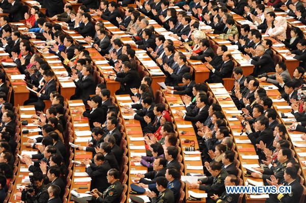 The Fourth Session of the 11th National People&apos;s Congress holds its closing meeting at the Great Hall of the People in Beijing, China, March 14, 2011.