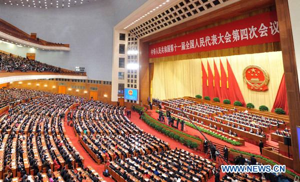 The Fourth Session of the 11th National People&apos;s Congress holds its closing meeting at the Great Hall of the People in Beijing, China, March 14, 2011.