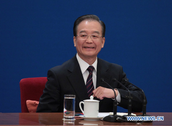 Chinese Premier Wen Jiabao attends a press conference after the closing meeting of the Fourth Session of the 11th National People&apos;s Congress (NPC) at the Great Hall of the People in Beijing, China, March 14, 2011. 