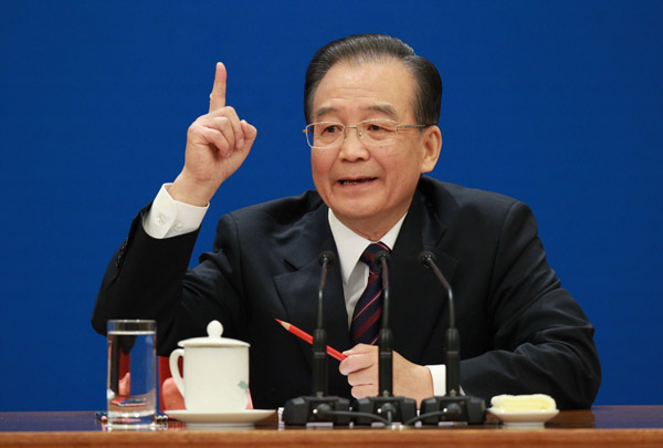 Chinese Premier Wen Jiabao attends a press conference after the closing meeting of the Fourth Session of the 11th National People&apos;s Congress (NPC) at the Great Hall of the People in Beijing, China, March 14, 2011.
