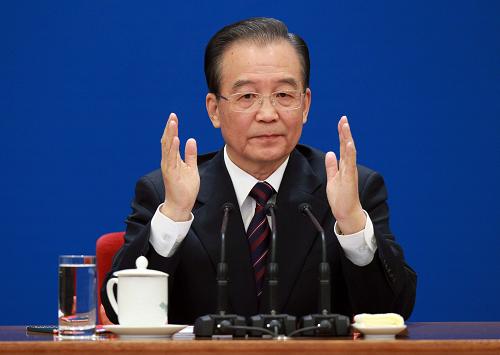 Chinese Premier Wen Jiabao meets the press after the closing meeting of the Fourth Session of the 11th National People&apos;s Congress (NPC) at the Great Hall of the People in Beijing, capital of China, March 14, 2011. 
