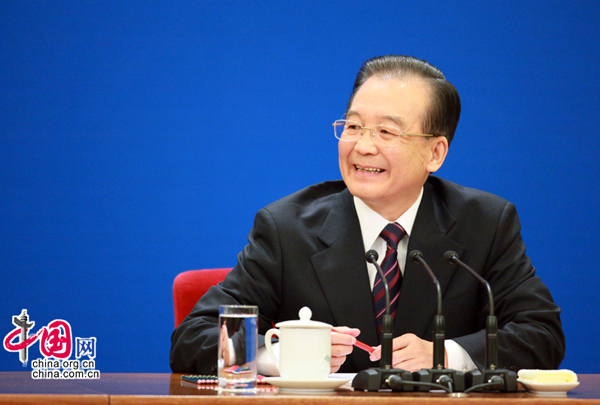 Chinese Premier Wen Jiabao meets the press after the closing meeting of the Fourth Session of the 11th National People&apos;s Congress (NPC) at the Great Hall of the People in Beijing, capital of China, March 14, 2011. [china.com.cn] 