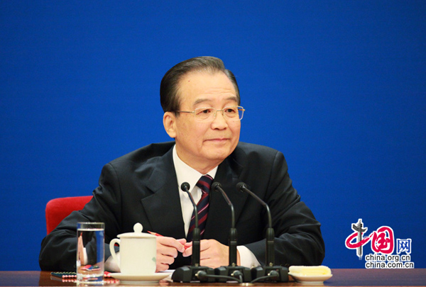 Chinese Premier Wen Jiabao meets the press after the closing meeting of the Fourth Session of the 11th National People&apos;s Congress (NPC) at the Great Hall of the People in Beijing, capital of China, March 14, 2011. [china.com.cn] 