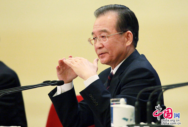 Chinese Premier Wen Jiabao answers questions during a press conference after the closing meeting of the Fourth Session of the 11th National People&apos;s Congress (NPC) at the Great Hall of the People in Beijing, China, March 14, 2011. [china.com.cn] 