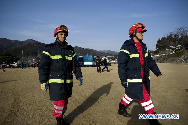 Members of the Chinese International Search and Rescue Team (CISAR) arrive at the earthquake hit Ofunato city in Iwate prefecture, Japan, March 14, 2011. 