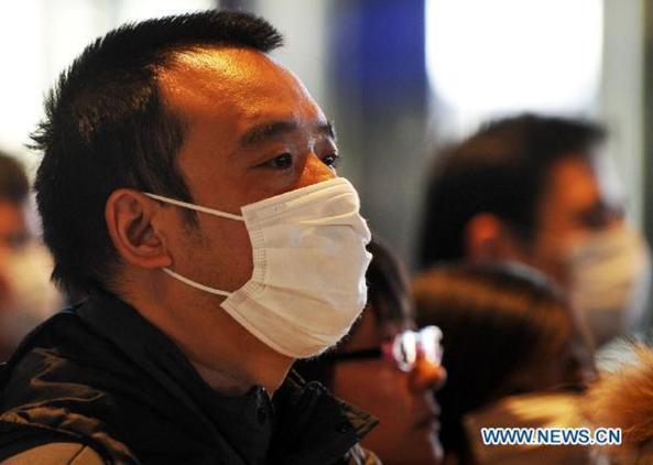 A Chinese man waits for evacuation at Narita airoprt in Tokyo, Japan, March 17, 2011. 
