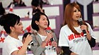 Japanese artist Makiyo (R) performs with Taiwan artists Bai Bing Bing (L) and Dee Hsu (central) during the 'Fight and Smile' fund-raising party for the earthquake-hit Japan held in Taipei, southeast China's Taiwan, March 18, 2011.