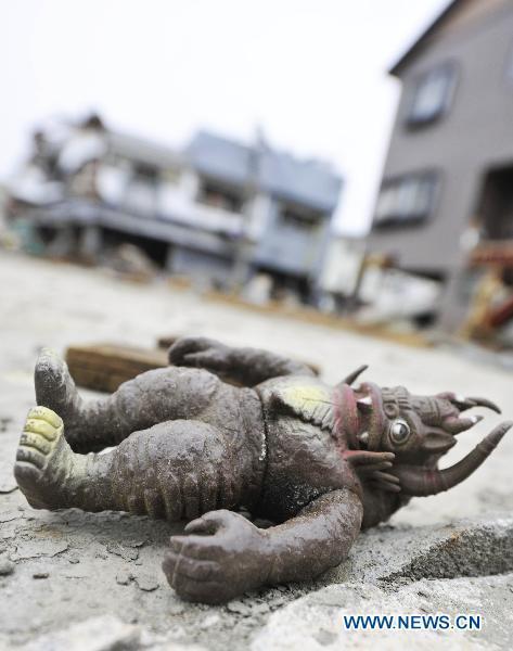 A toy lies on the ground, the aftermath of the March 11 tsunami and earthquake, in the city of Kesennuma in Miyagi prefecture, Japan, on March 20, 2011. 