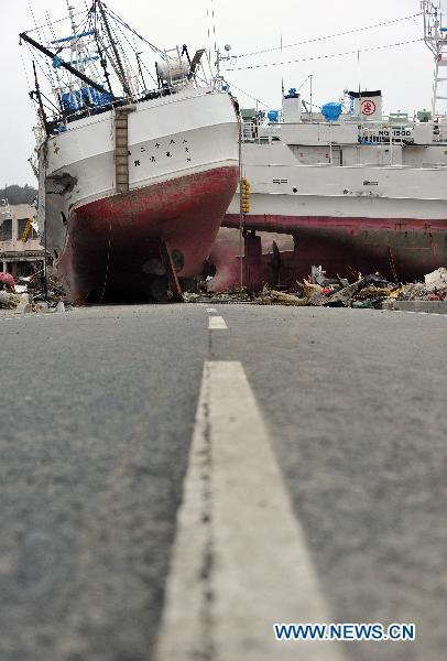 Ships stand on the ground, the aftermath of the March 11 tsunami and earthquake, in the city of Kesennuma in Miyagi prefecture, Japan, on March 20, 2011. 